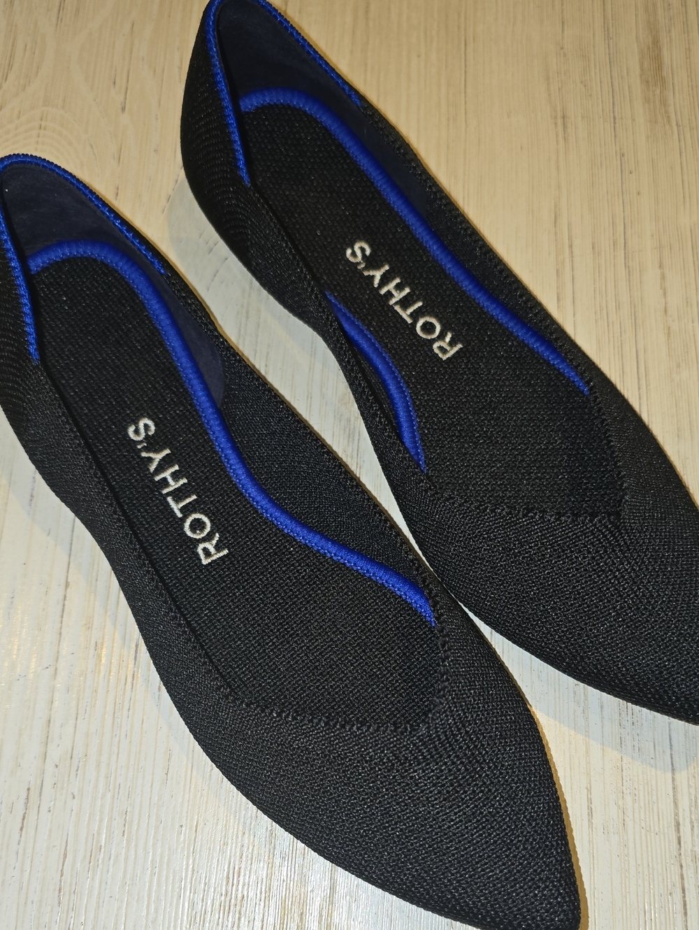 Rothy's Black Pointed Knit Flats with Royal Blue Trim